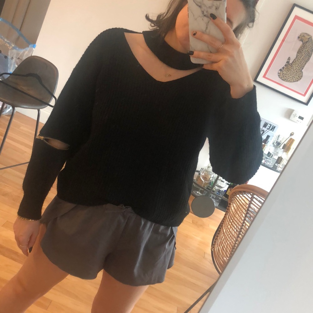 Black cutout nastygal sweater with zipper details.